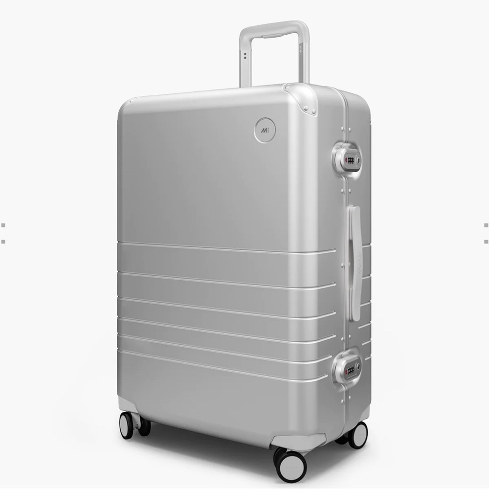 Brand new in box Monos Hybrid, Silver medium Check-In Suitcase.